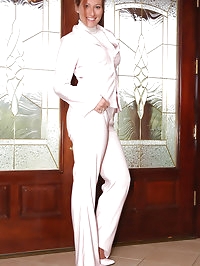 Beauty in nylon pantyhose and white suit