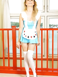 Natasha in Alice in Wonderland outfit with white opaque..